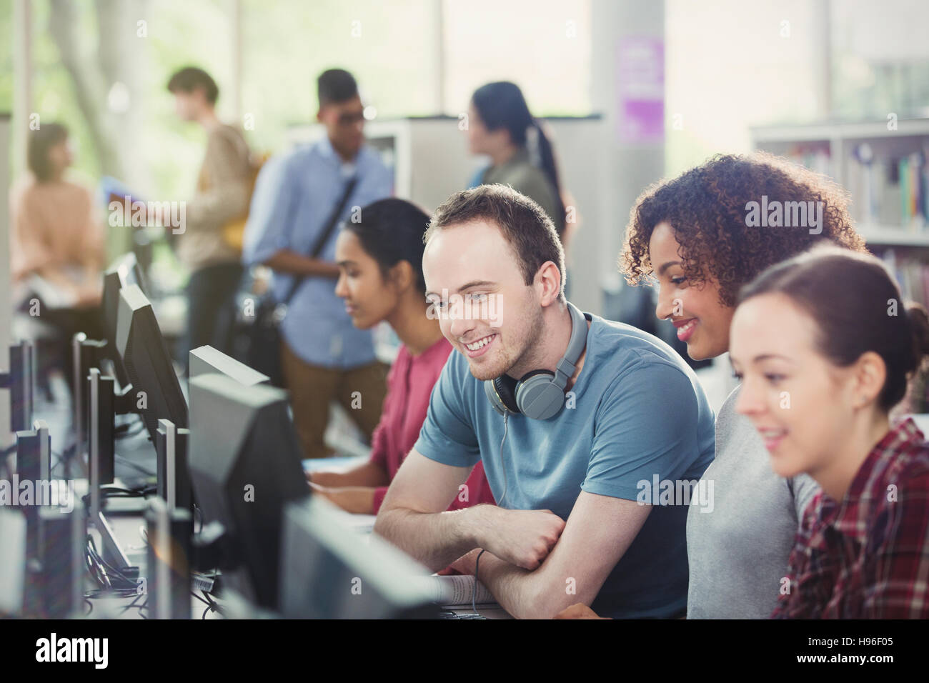 College students using computers in computer lab library Stock Photo ...