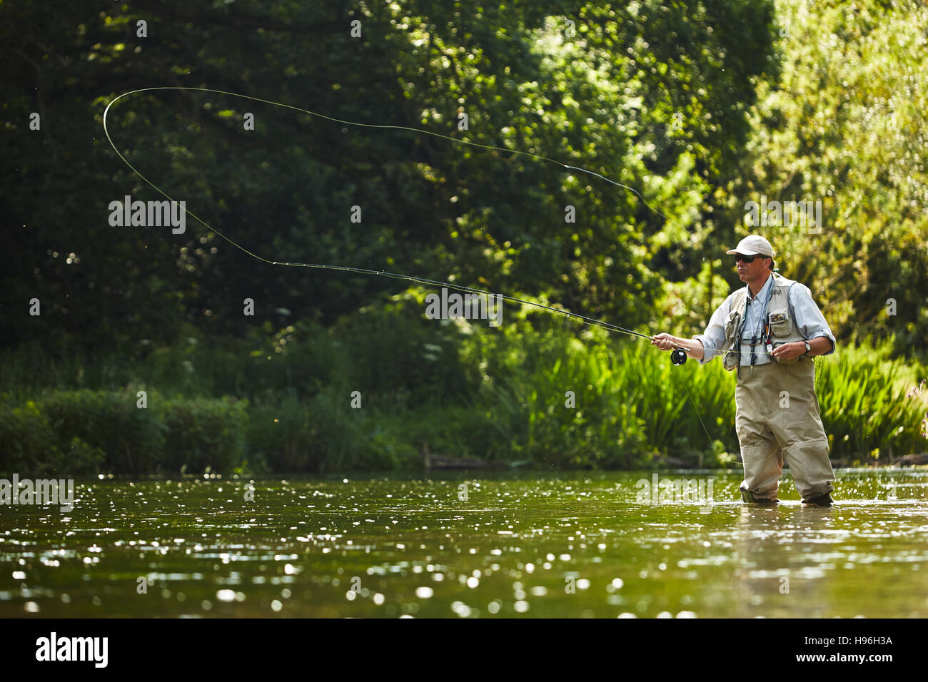 Senior man fly fishing hi-res stock photography and images - Alamy