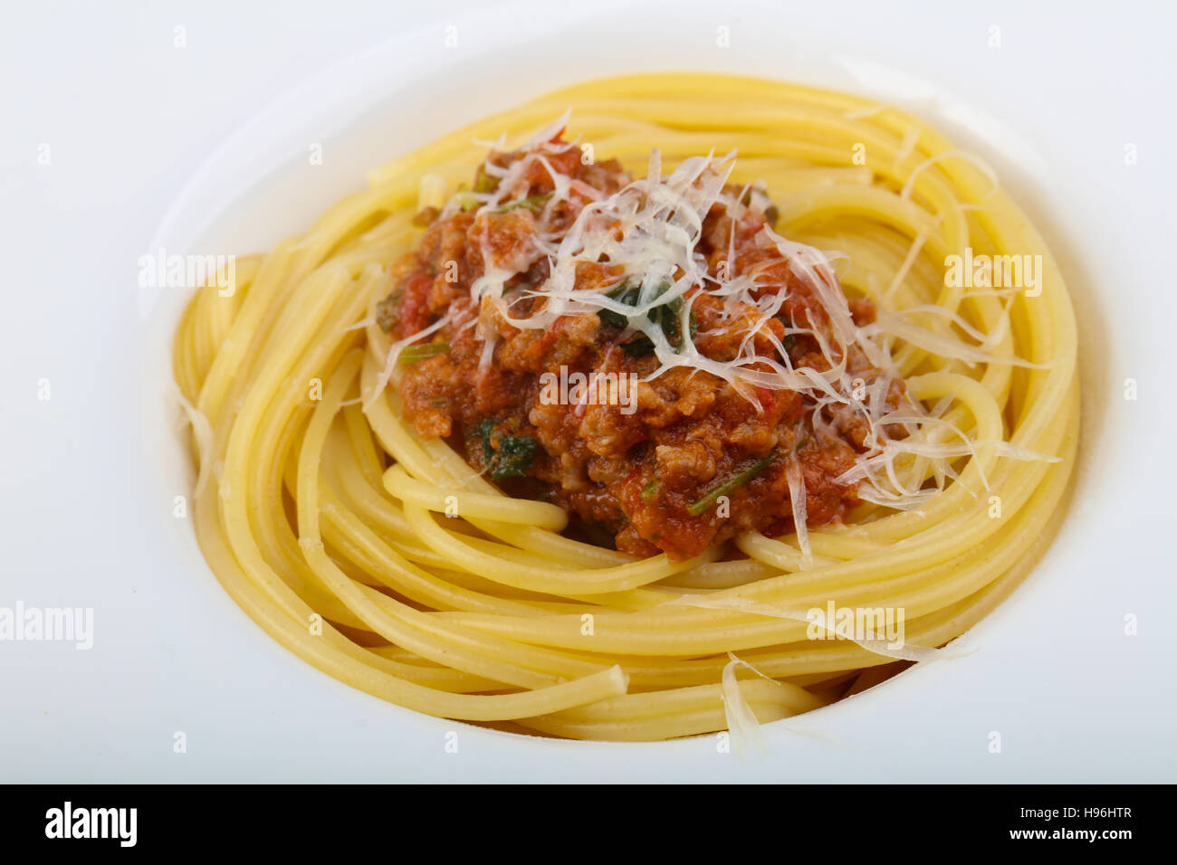 Spaghetti bolognese with parmesan and basil leaves Stock Photo Alamy