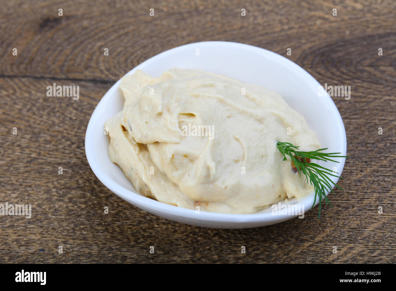 Arabic traditional cusine hummus with dill and cedar nuts Stock Photo