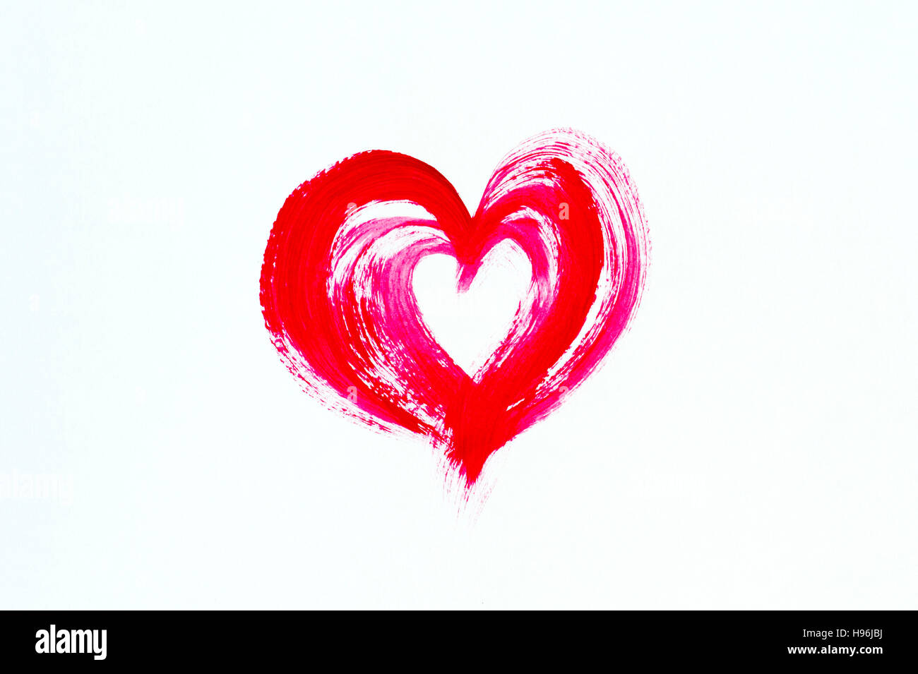 Painted red heart on white background Stock Photo - Alamy