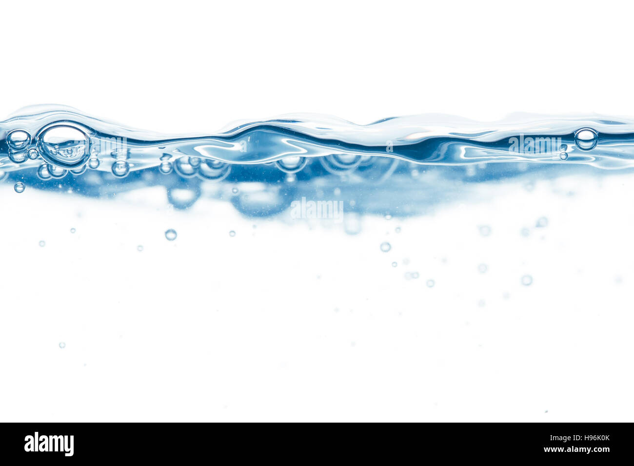 Blue steady water surface with a few bubbles Stock Photo