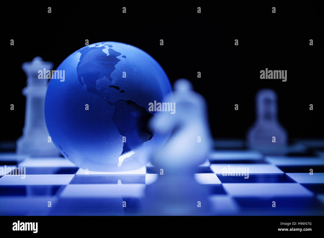 Globe on chess board Stock Photo - Alamy