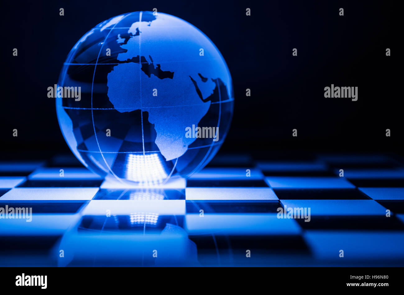 Globe on chess board Stock Photo - Alamy