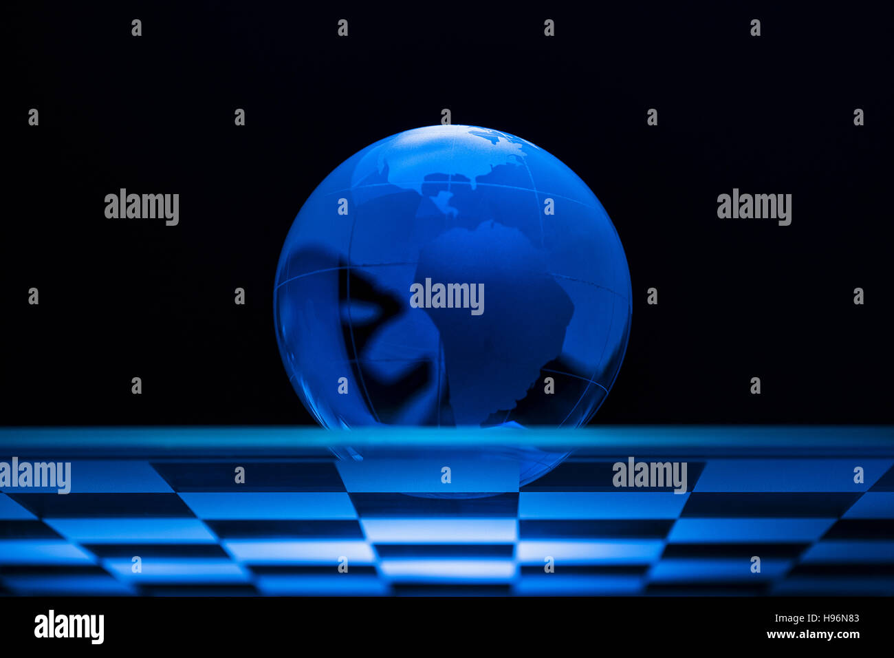 Globe on chess board Stock Photo - Alamy