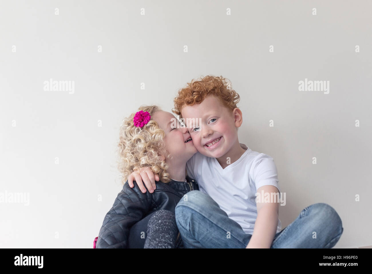 Portrait of two siblings (4-5, 8-9) Stock Photo