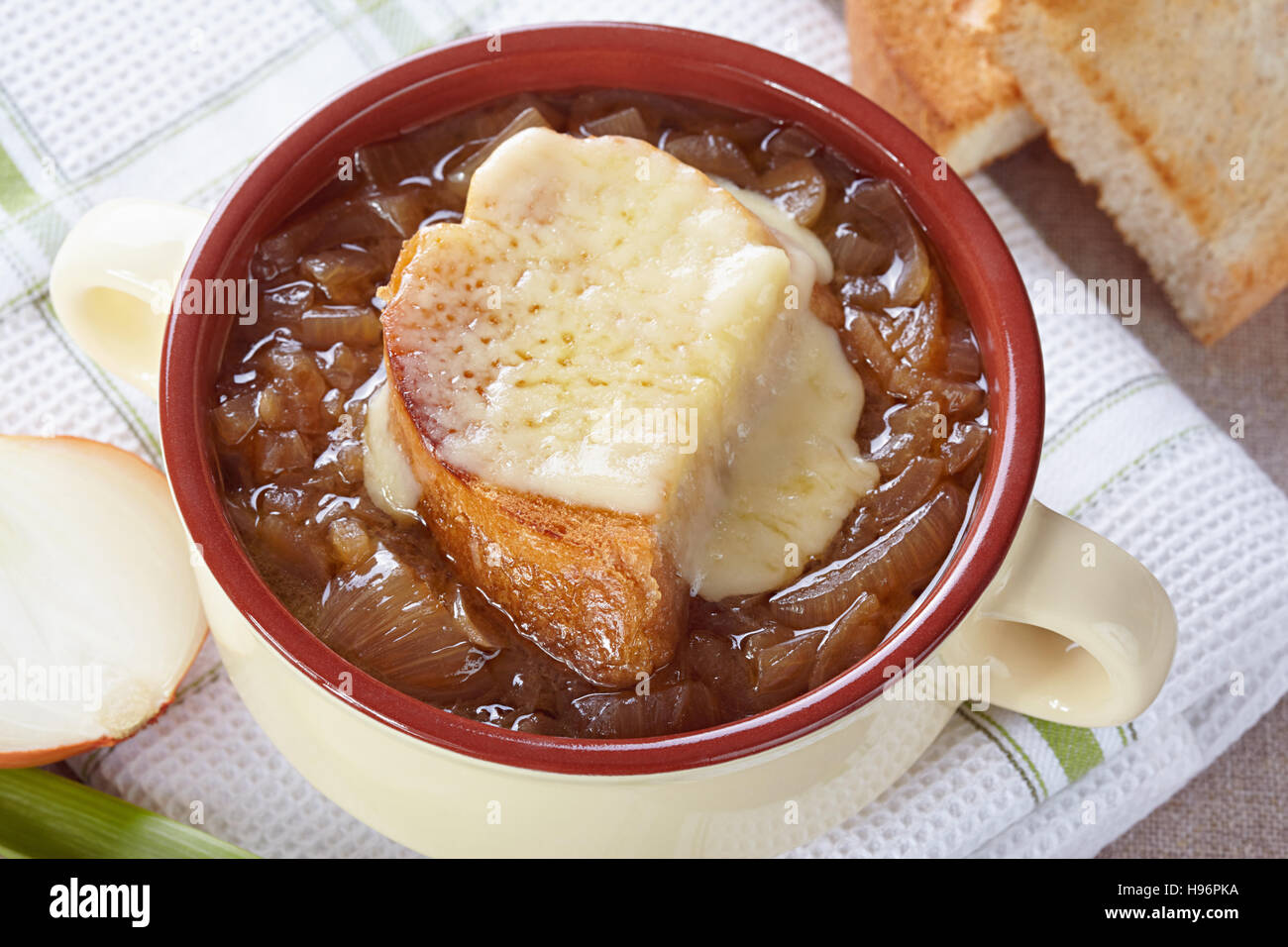French cuisine. Onion soup served in a tureen Stock Photo