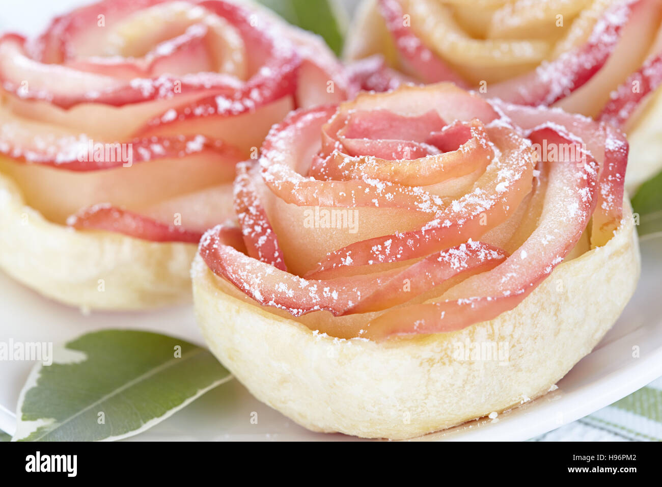 Rose from apple and puff pastry Stock Photo Alamy