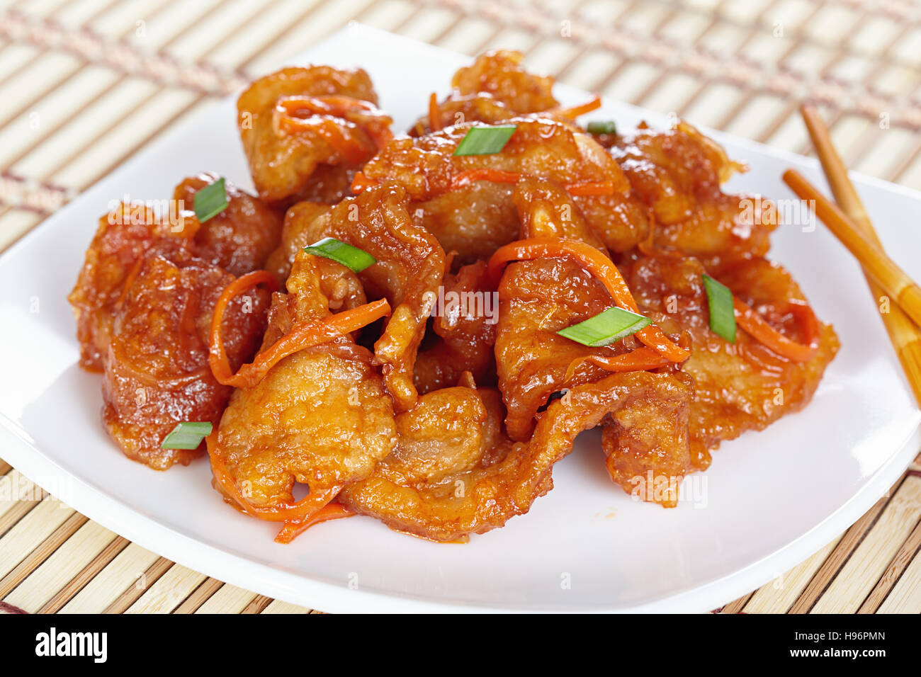 Chinese cuisine. Pork in batter and sweet and sour sauce Stock Photo