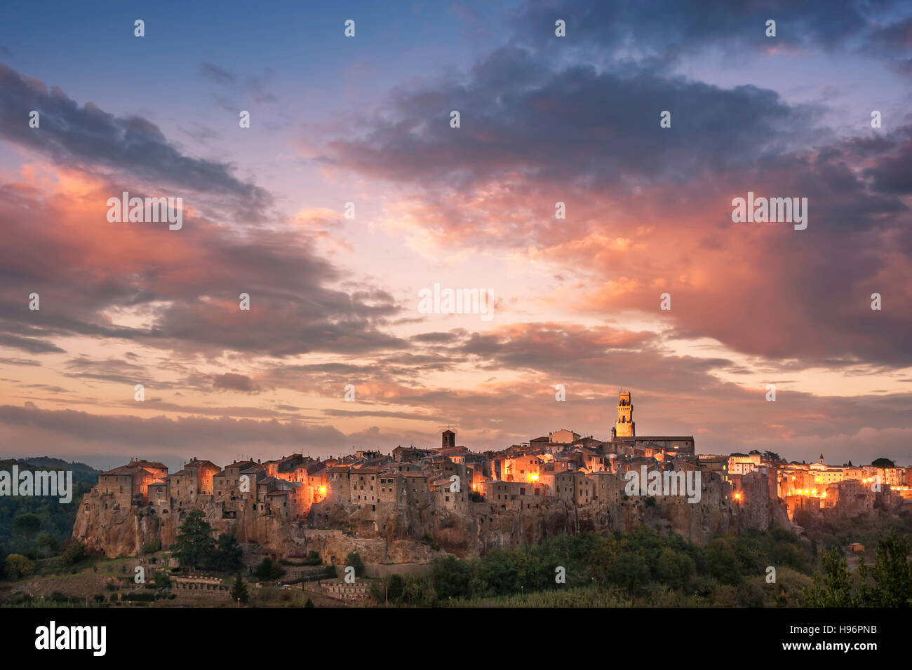 Majestic sunset over ancient Italian town Pitigliano, Tuscany, Italy Stock Photo