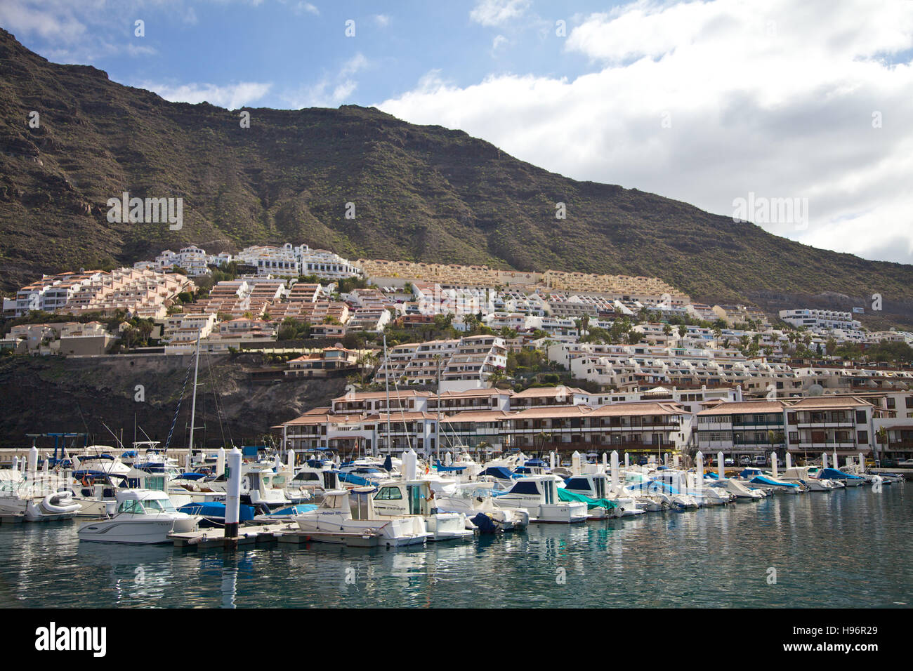 Harbour and housing area in Puerto de Santiago, Tenerife, Spain Stock Photo