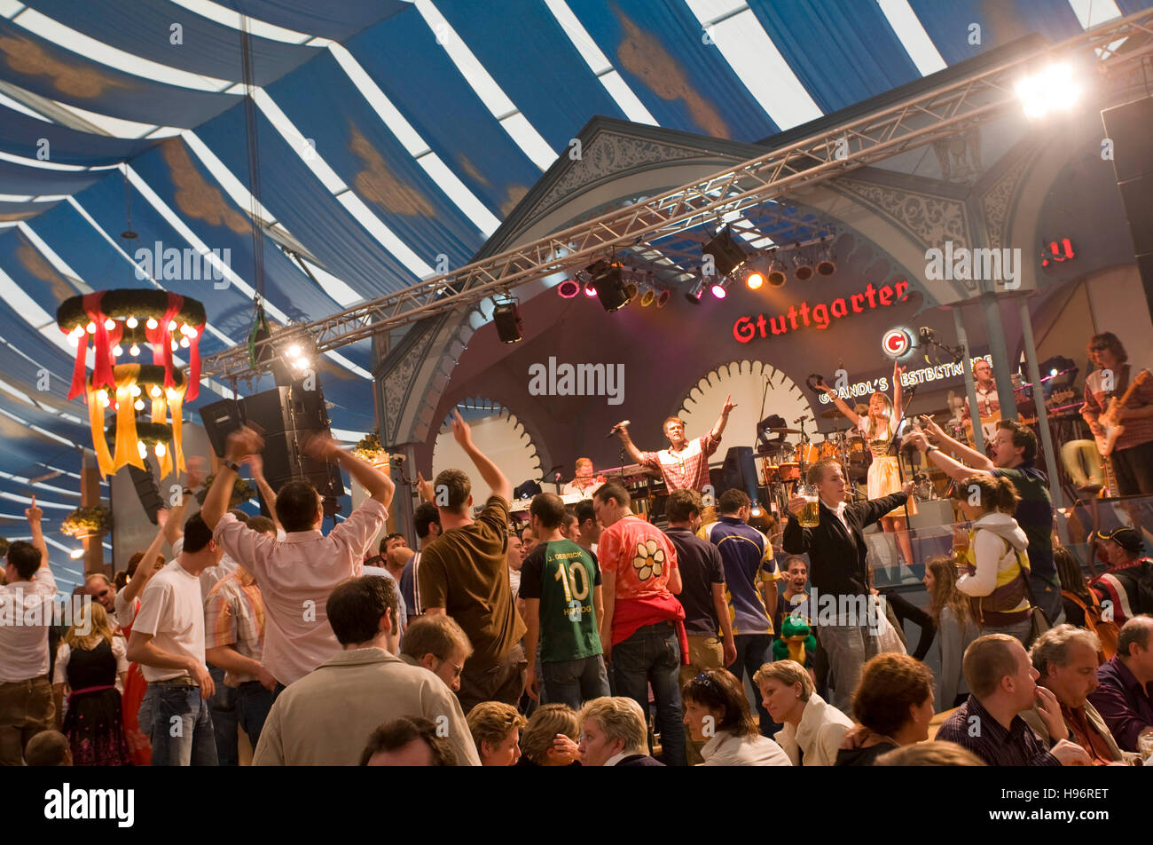 People in a beer tent, Cannstatter Festival, Bad Cannstatt, Stuttgart, Baden-Wuerttemberg, Germany Stock Photo