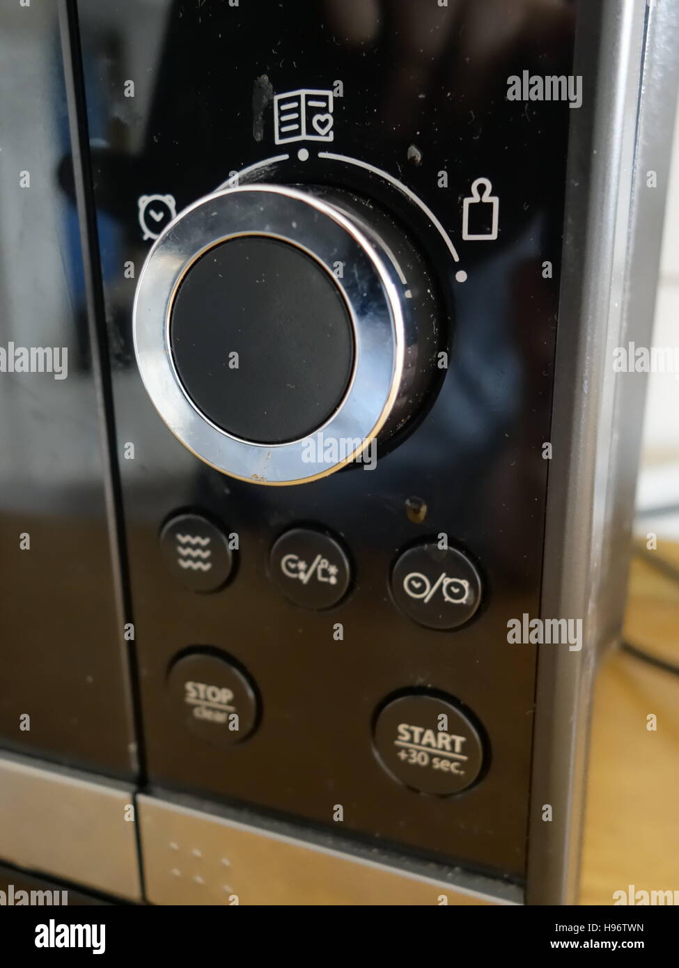 The dial on a microwave Stock Photo Alamy