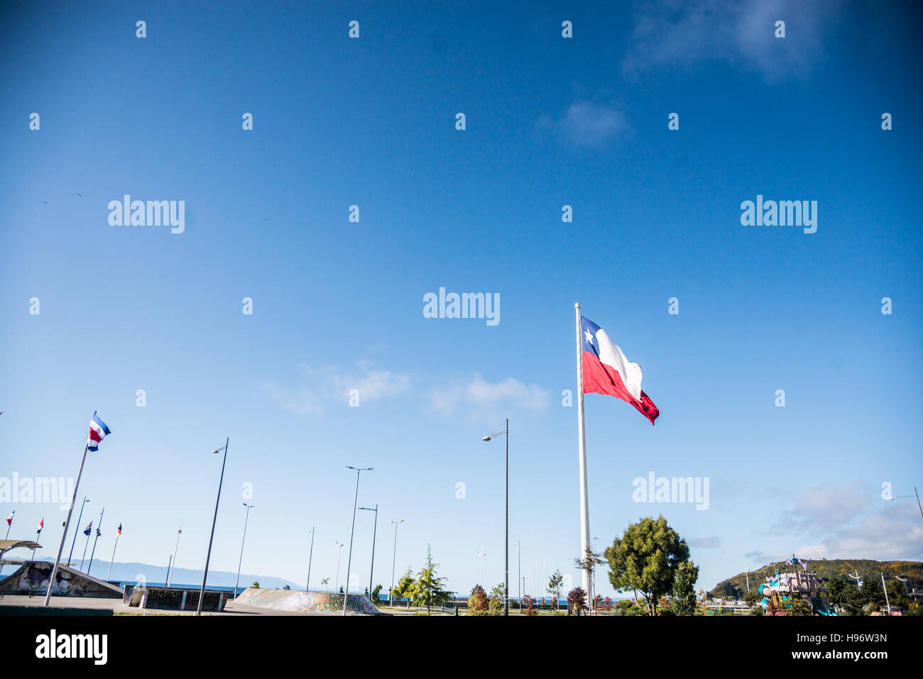 Chile Flags waving in the wind Stock Photo - Alamy