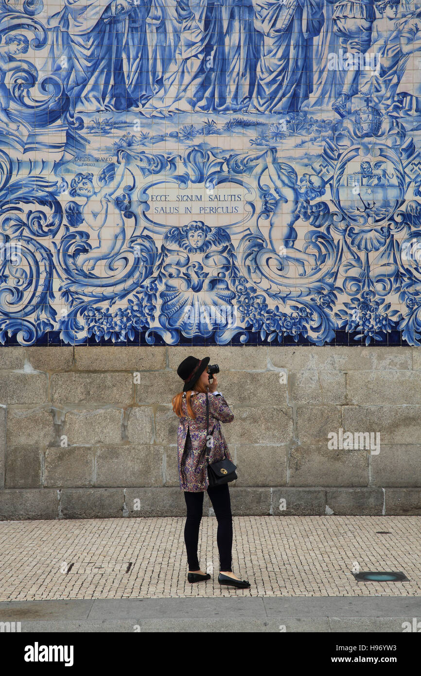 Typical blue and white azulejo tiles on the side of the 18th century Carmo church, in Porto, Portugal, southern Europe Stock Photo