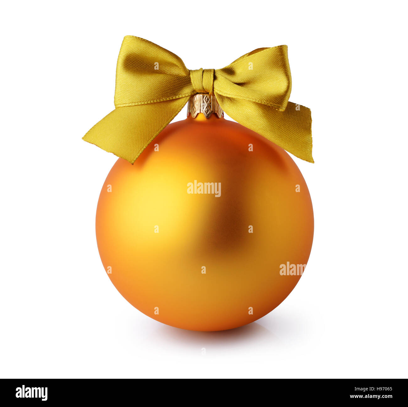 Golden Christmas ball with silk ribbon bow isolated on white background ...