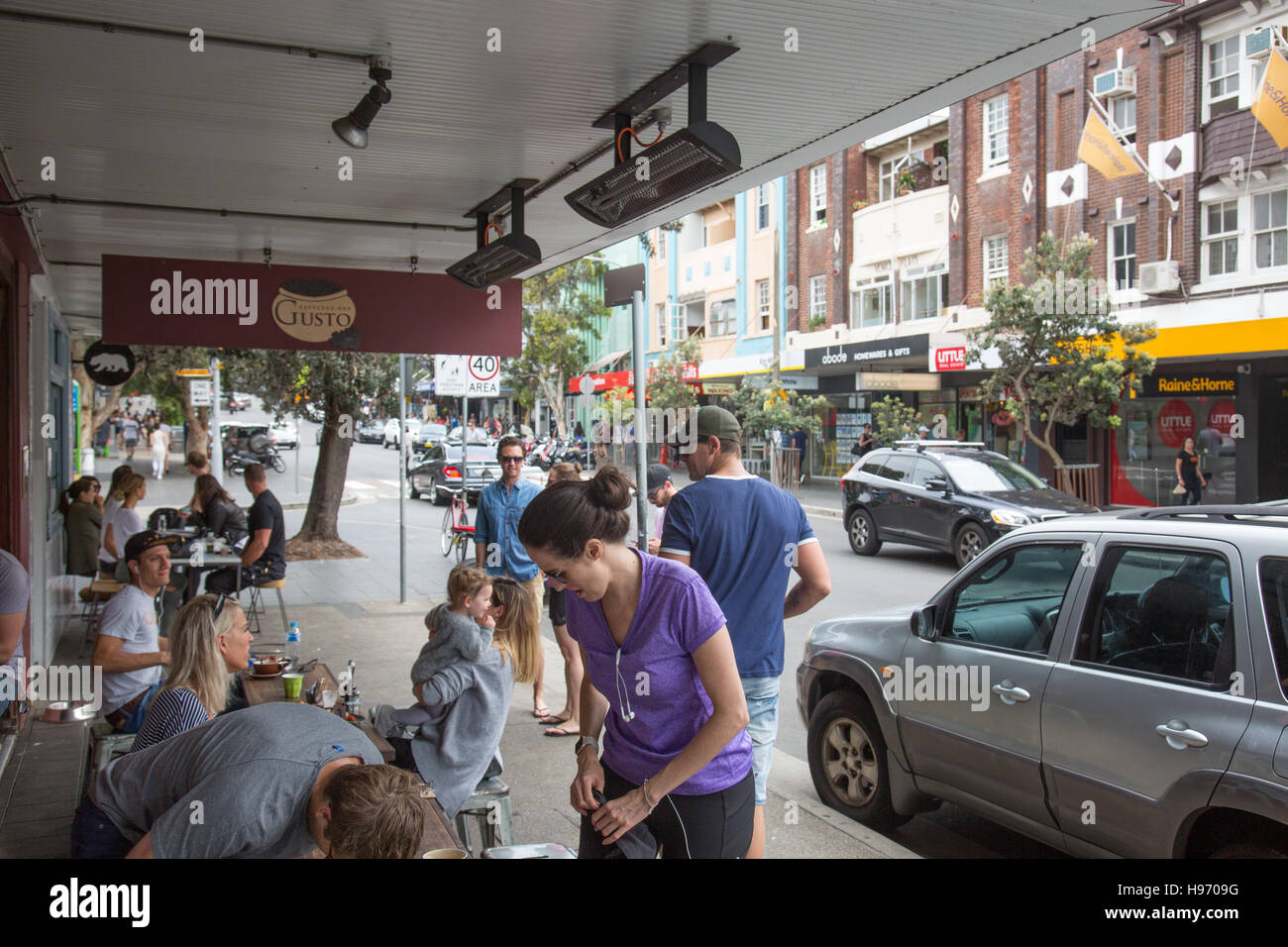 People eating and drinking coffee at a Bondi Beach Cafe and restaurant,Sydney,NSW,Australia Stock Photo