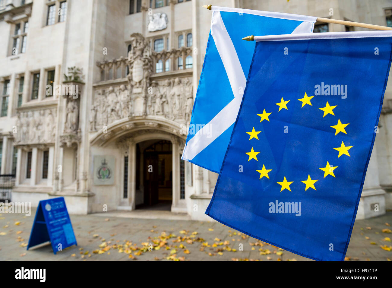 European Union and Scottish flags flying at The Supreme Court of the United Kingdom in the Middlesex Guildhall building London Stock Photo