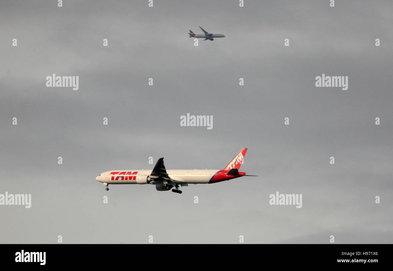 A TAM Airlines passenger jet flies over Richmond Park, London, Britain November 19,  2016.  © John Voos Stock Photo