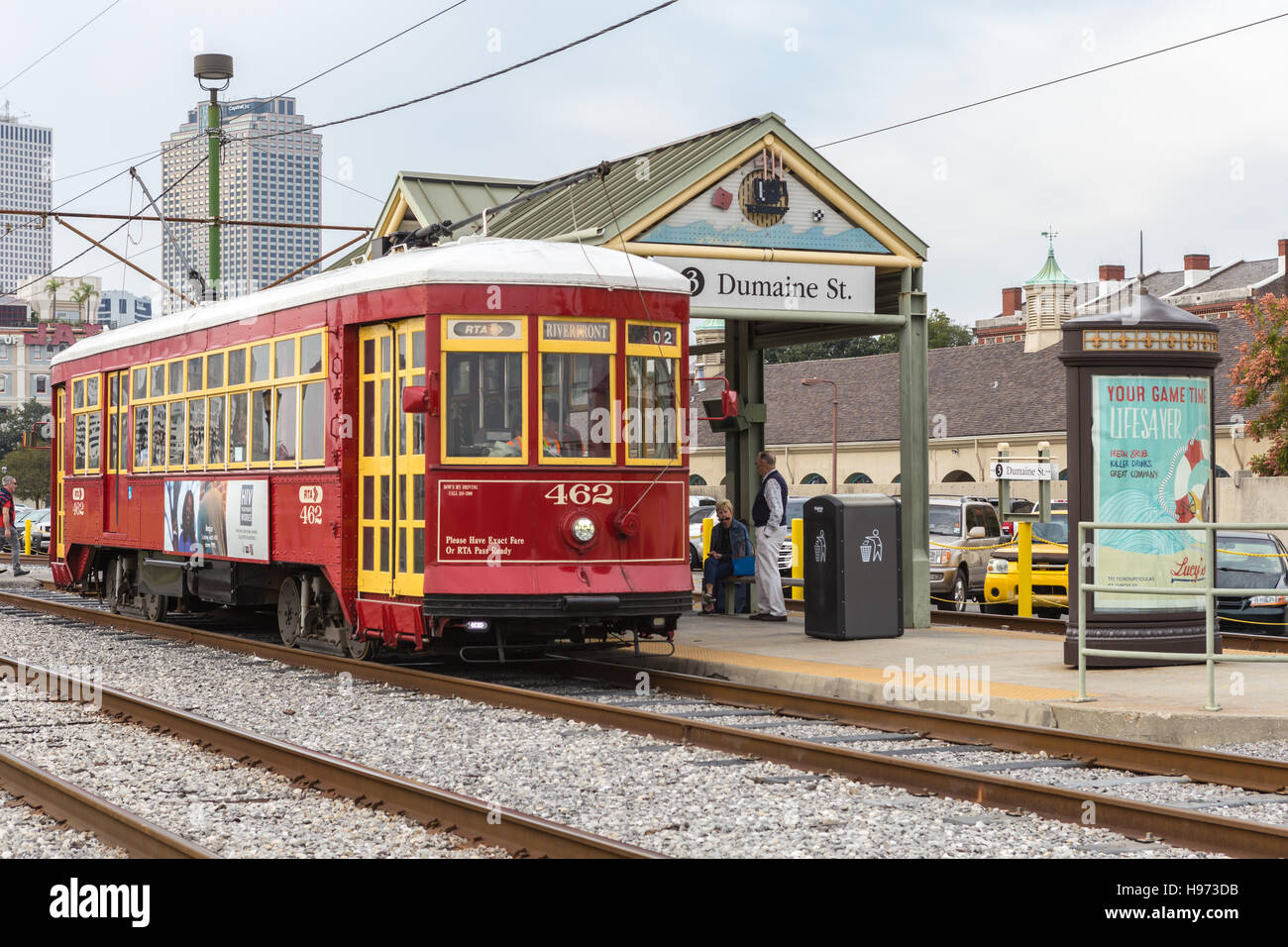 Passengers board an RTA streetcar at the Dumaine Street station on the Riverfront Line in New Orleans, Louisiana. Stock Photo