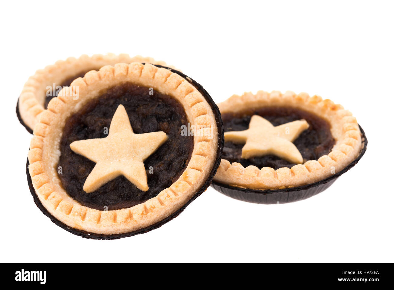 Three Christmas mince pies - white background Stock Photo - Alamy