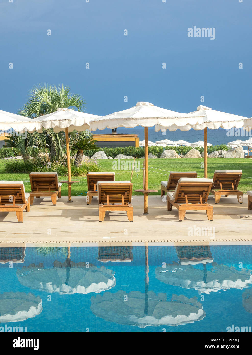 Luxury hotel bedroom swim up plunge pool and view to the beach Stock Photo