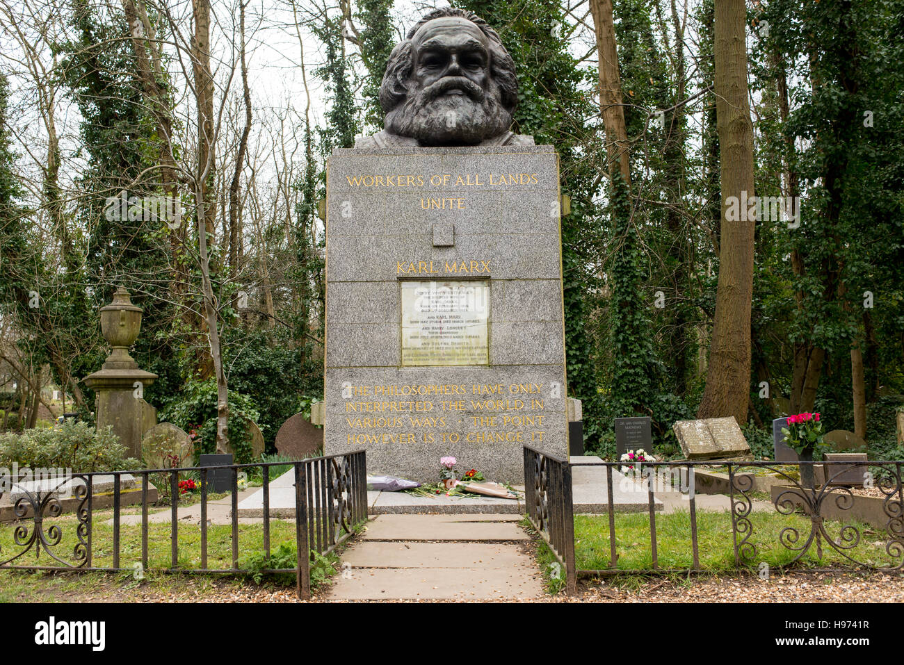 Tomb and statue of socialist philosopher and economist Karl Marx, located in the famous Highgate Cemetery in north London Stock Photo