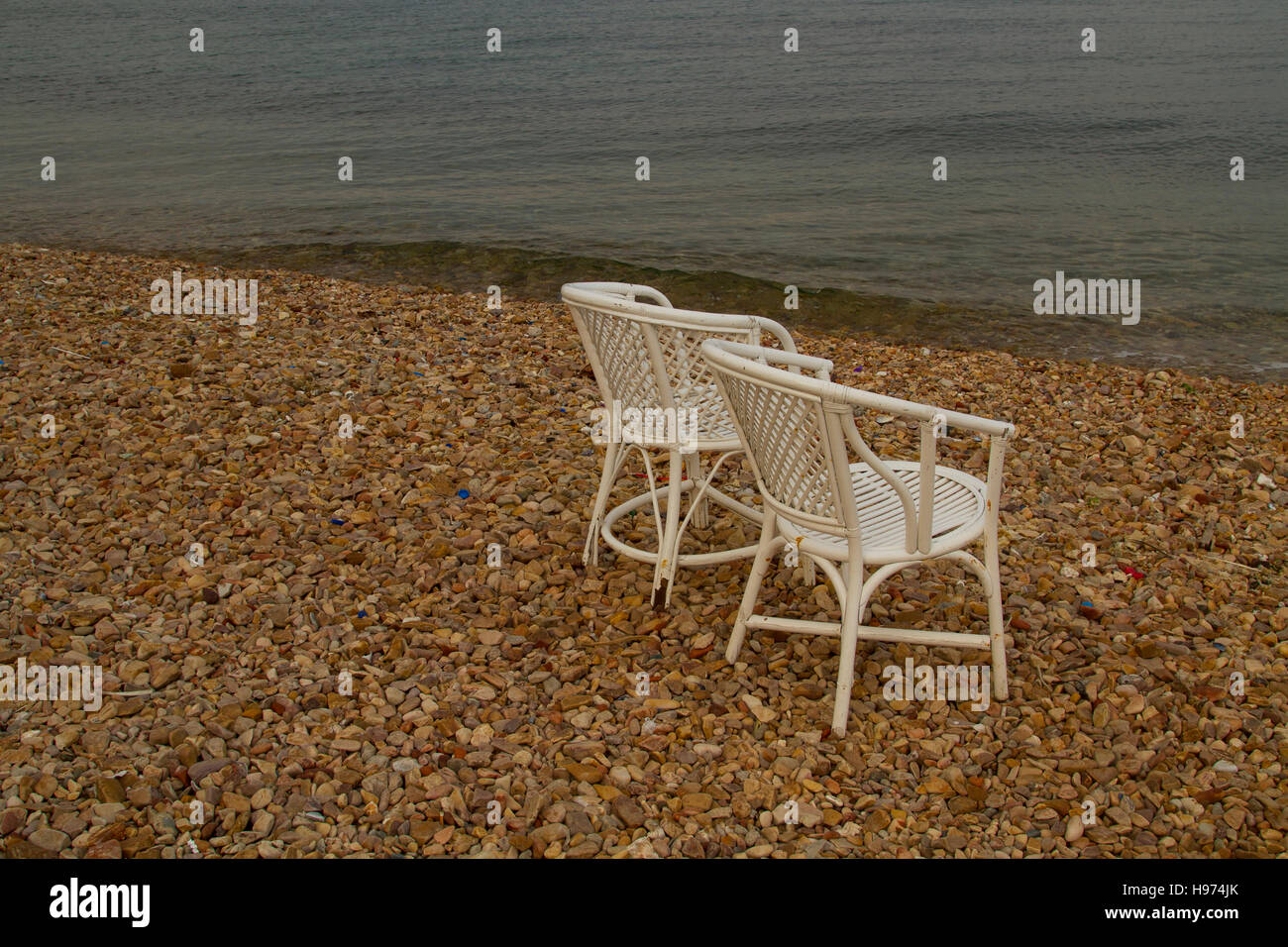 Two empty beach chair hi-res stock photography and images - Alamy