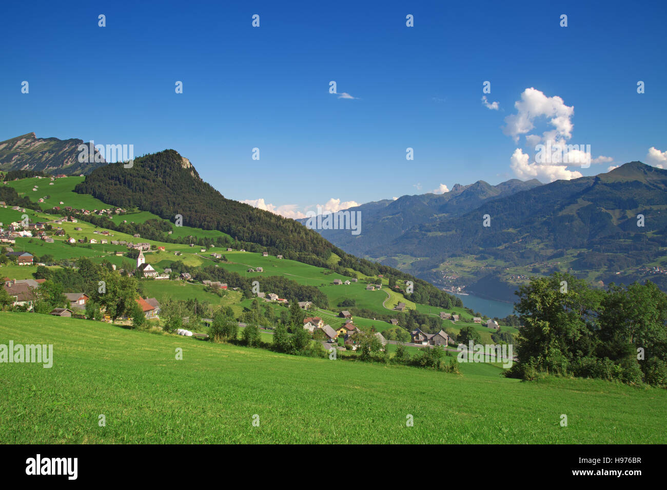 Small village in swiss alps Stock Photo - Alamy