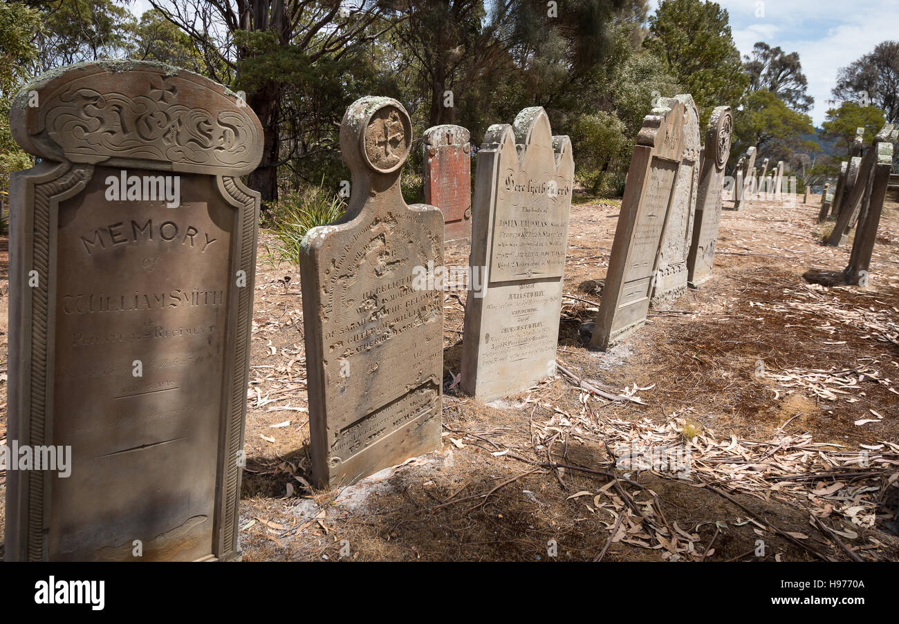 Old, abandoned gravestones on the Isle of the Dead, Port Arthur, Tasmania, containing convicts and staff from the penal colony. Stock Photo