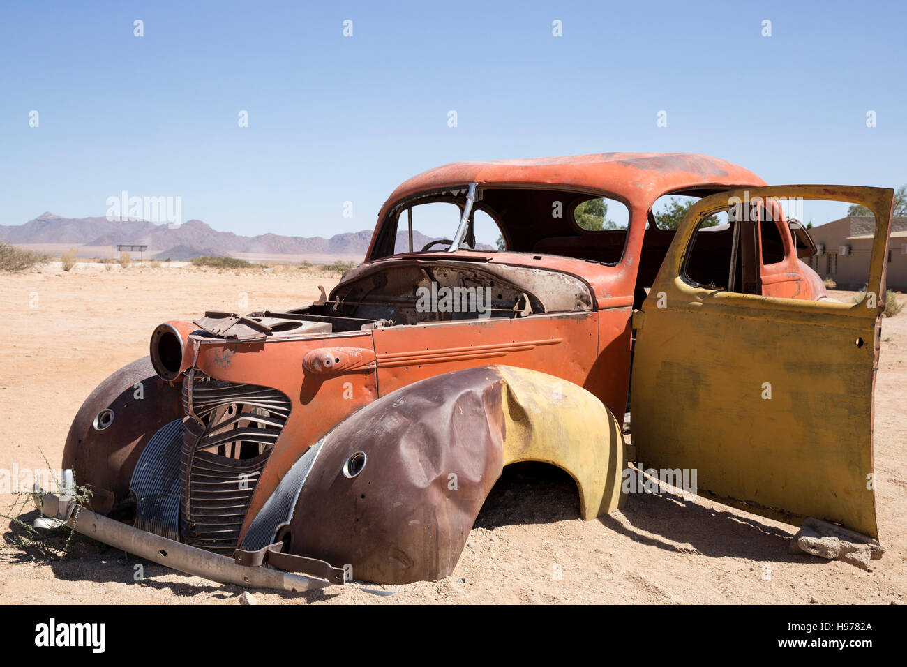 Abandoned car wreck in Namibian desert Stock Photo - Alamy