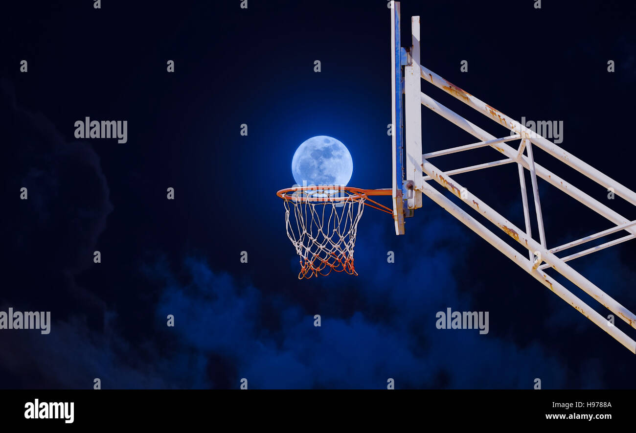 moon in a basketball hoop Stock Photo Alamy