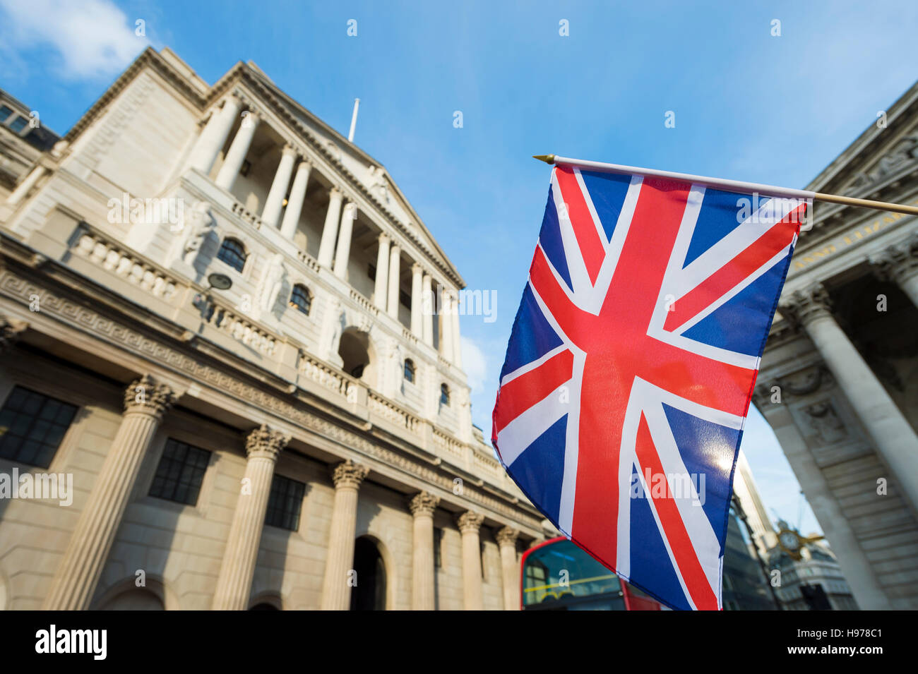 British Union Jack flag flying in front of the Bank of England in the City of London financial center Stock Photo