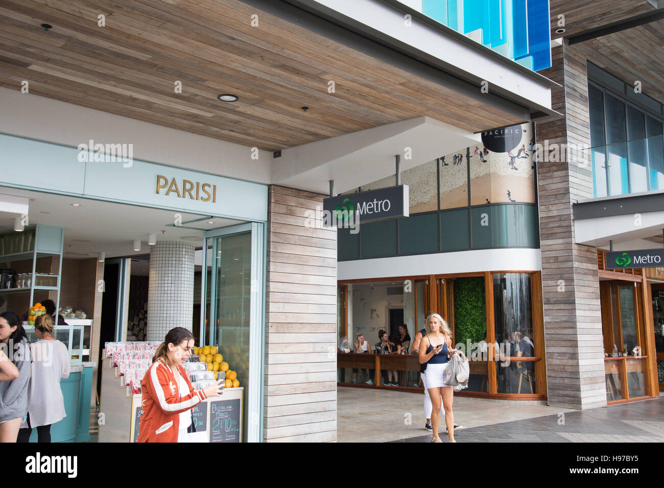 Bondi Beach Sydney retail outlets and shops on Campbell Parade, Bondi,NSW,Australia Parisi cafe and Woolworths metro supermarket Stock Photo