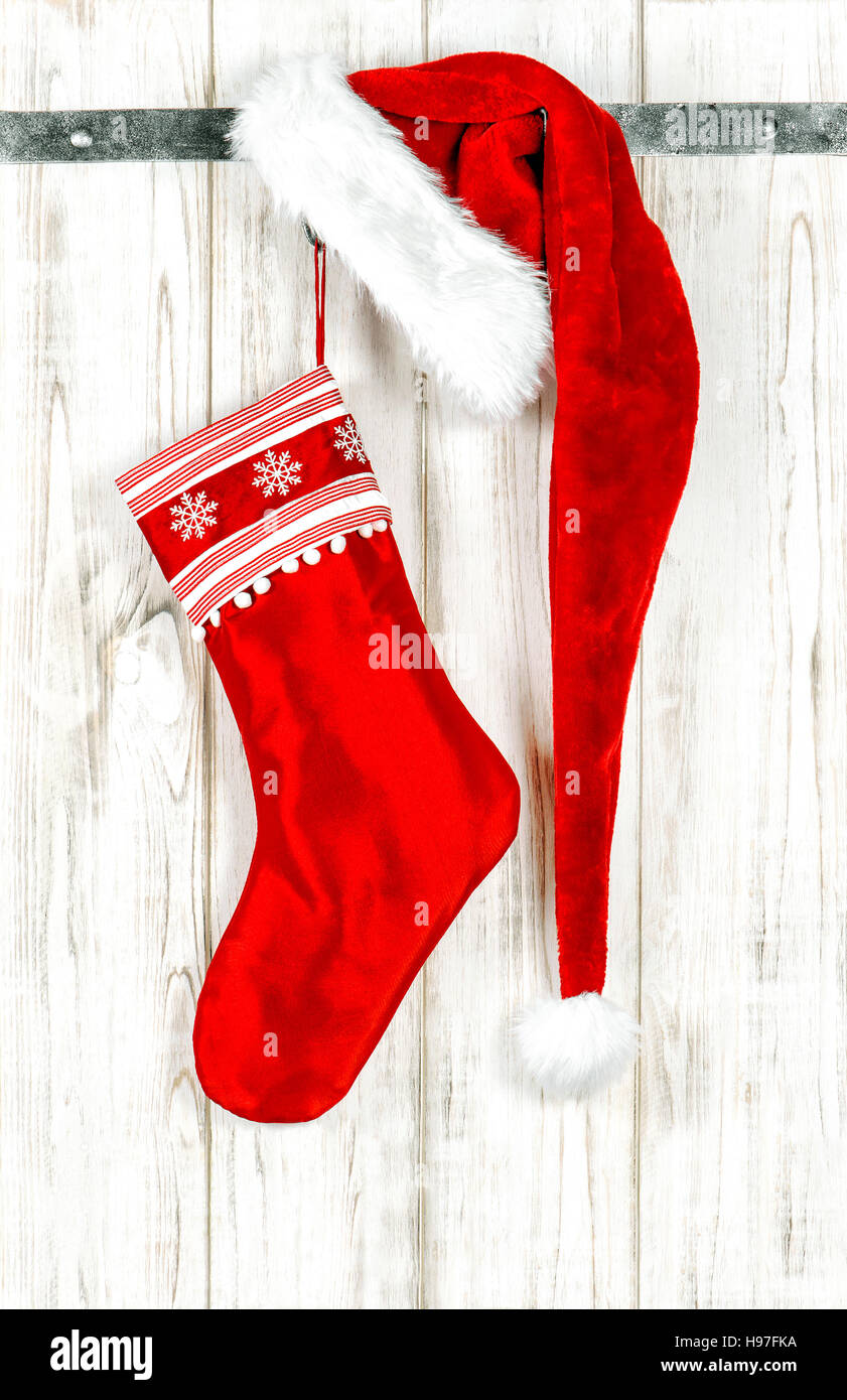 Festive Christmas decoration with red ornaments. Christmas stocking Stock Photo