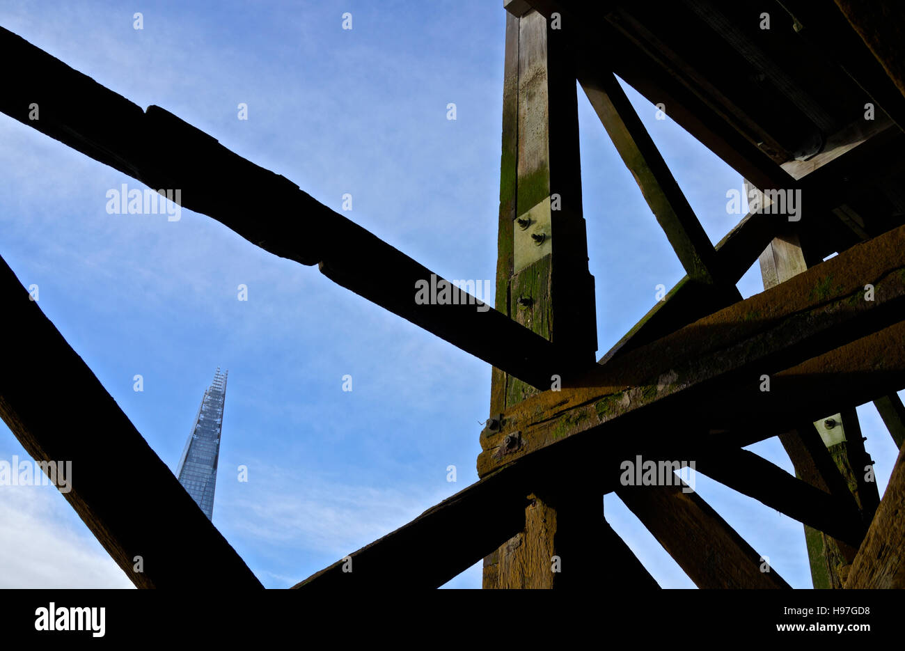 The Shard, London, viewed from the opposite bank of the river Thames at low tide. Stock Photo