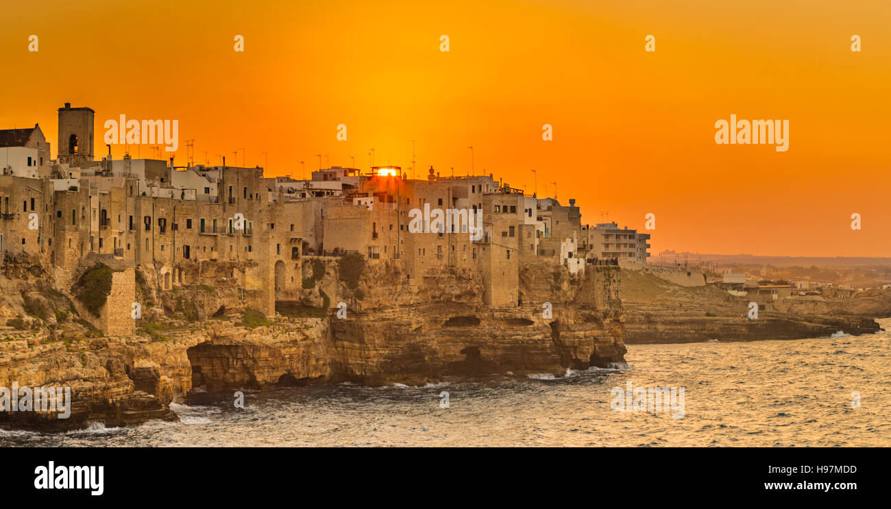 sunset on seaside village in Apulia, Italy Stock Photo - Alamy