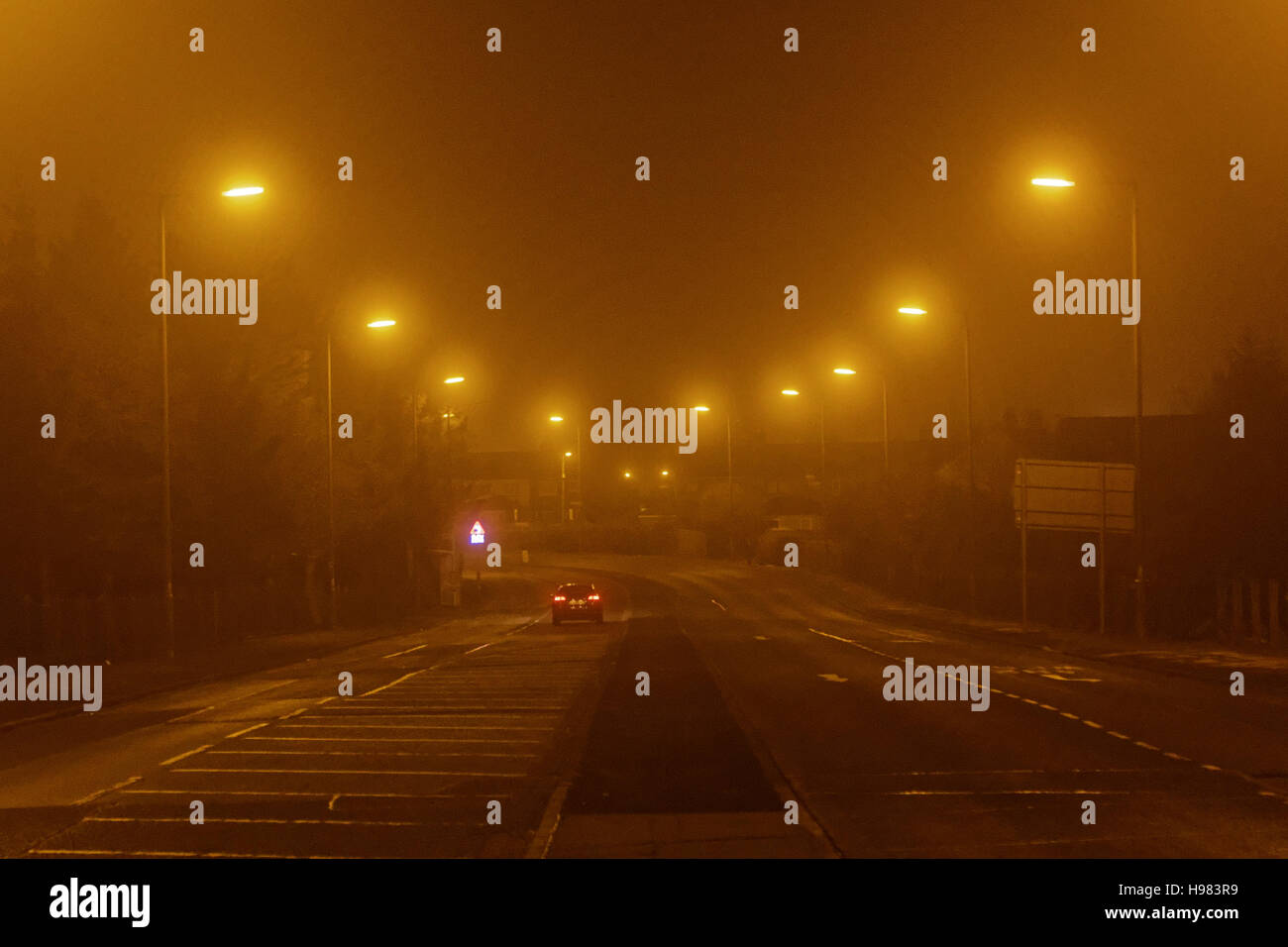 night Glasgow fog misty conditions traffic driving car Stock Photo