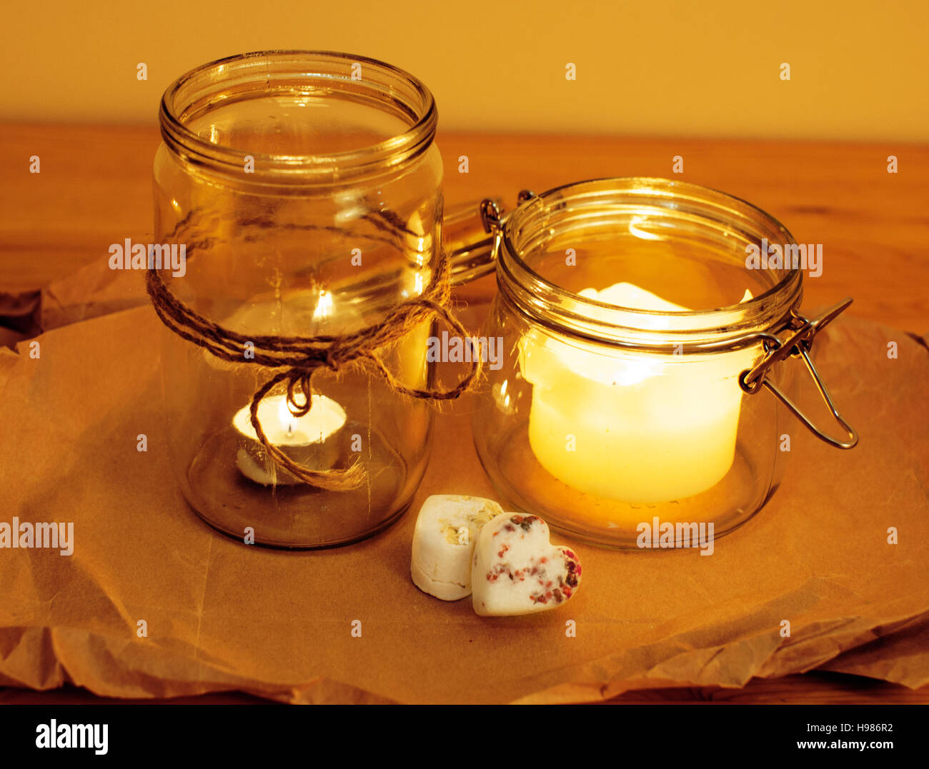 candles in glass burning romantic celebration concept wooden kitchen