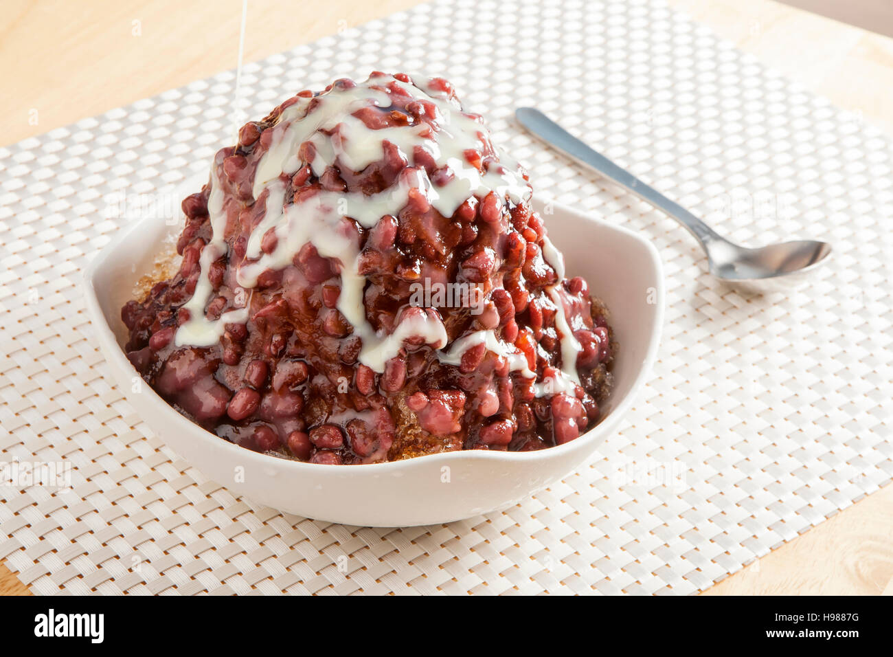 Traditional Japanese Dessert , A Bowl of Red Bean Sweet with red ice on