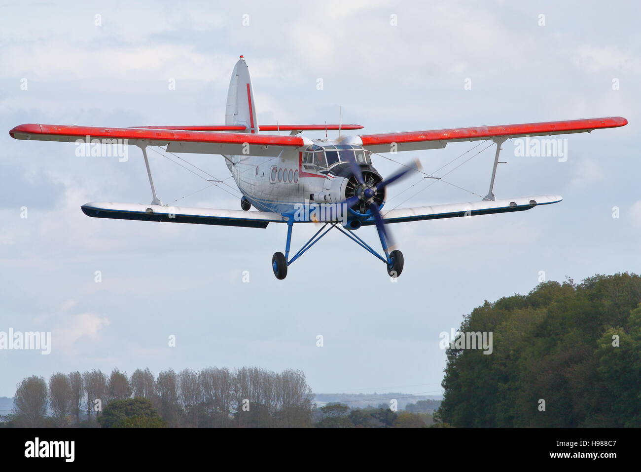 Antonov An-2 flying at Kemble Airfield, Gloucestershire, England Stock Photo