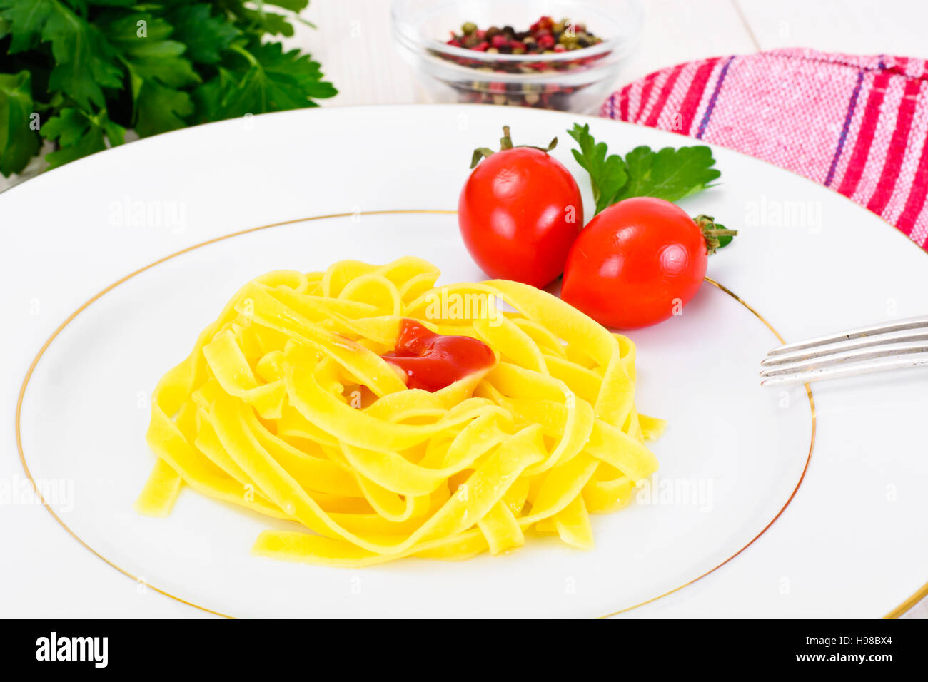 Food without meat Spaghetti on White Plate. Studio Photo Stock Photo