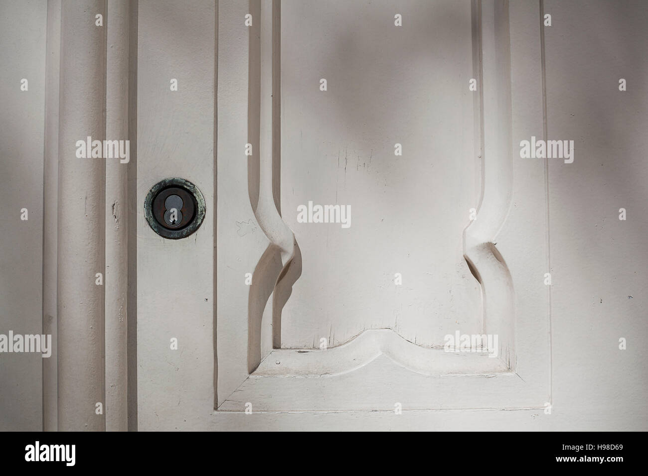 White wooden door with decorative panels Stock Photo