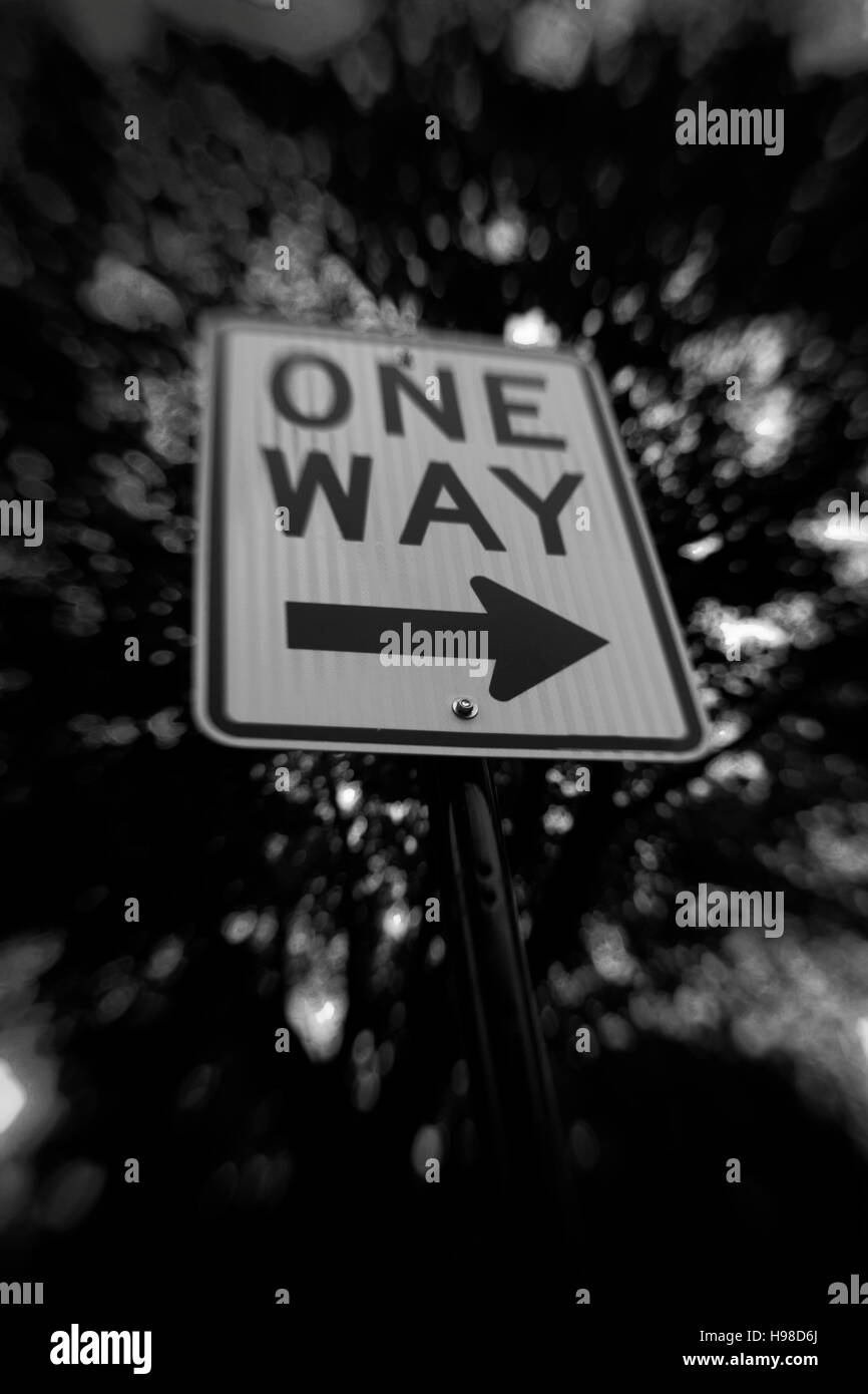 One way sign with direction arrow pointing right Stock Photo