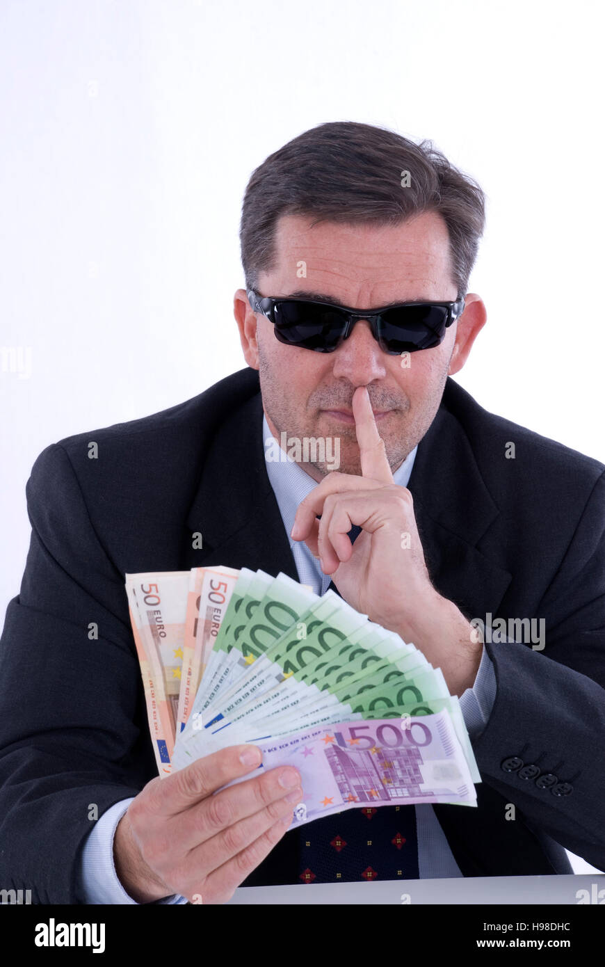 Symbolic picture for tax avoidance, black money Stock Photo