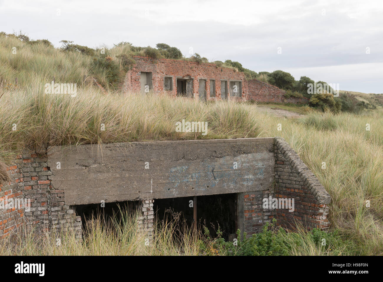 Old German bunker on the island of Terschelling in the Netherlands, part of the Atlantic Wall, a more than 5000 kilometres long line of defence, which Stock Photo
