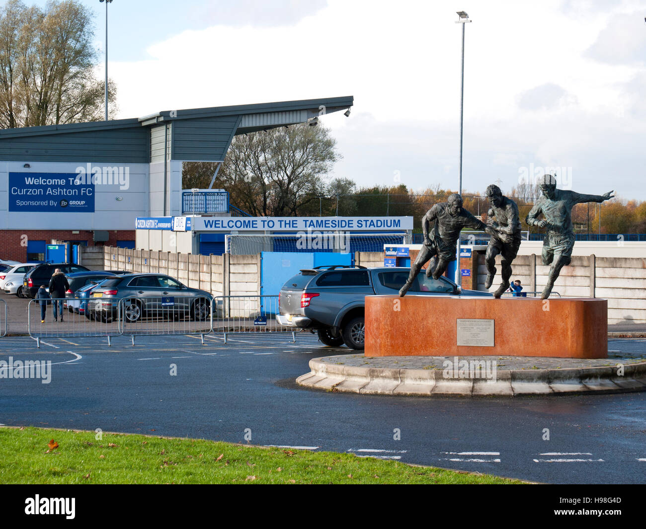 Statues of three world cup players outside Curzon Ashton football