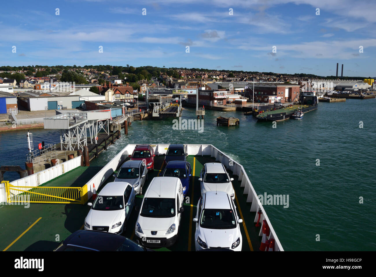 The car deck on a Red Funnel roll-on/roll-off car ferry approaching the ferry terminal at East Cowes on the Isle of Wight. Stock Photo
