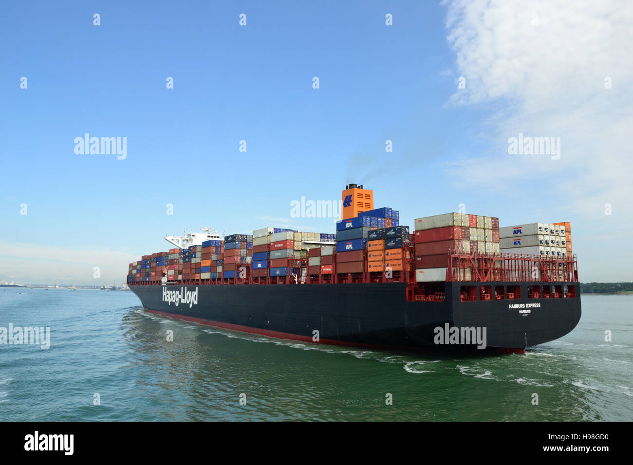 The Hamburg Express, container ship built in 2012 sailing up Southampton Water to the the port of Southampton. Stock Photo