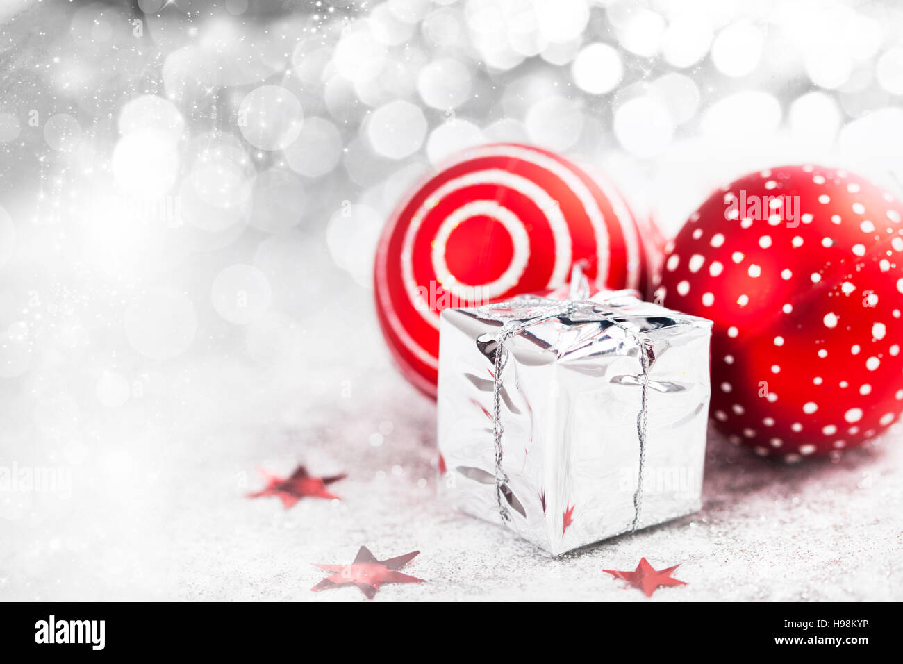 Sparkling Christmas background with red baubles Stock Photo Alamy